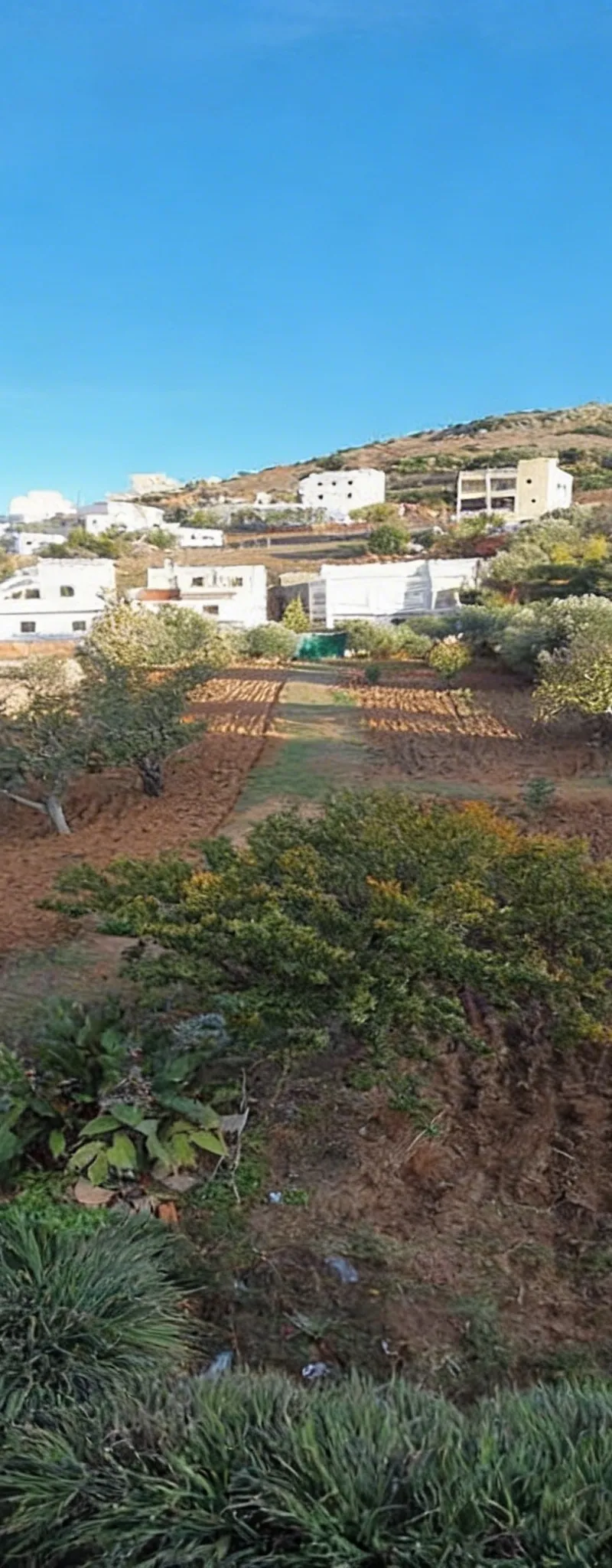 Terrain titré avec maison à vendre à Aouchtam
